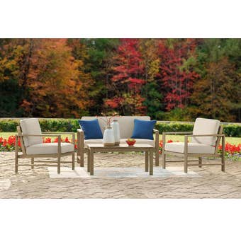 Signature Design by Ashley Fynnegan Outdoor Loveseat and 2 Chairs with Coffee Table PKG013826